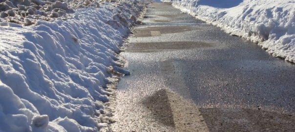 Road with snow on the edges